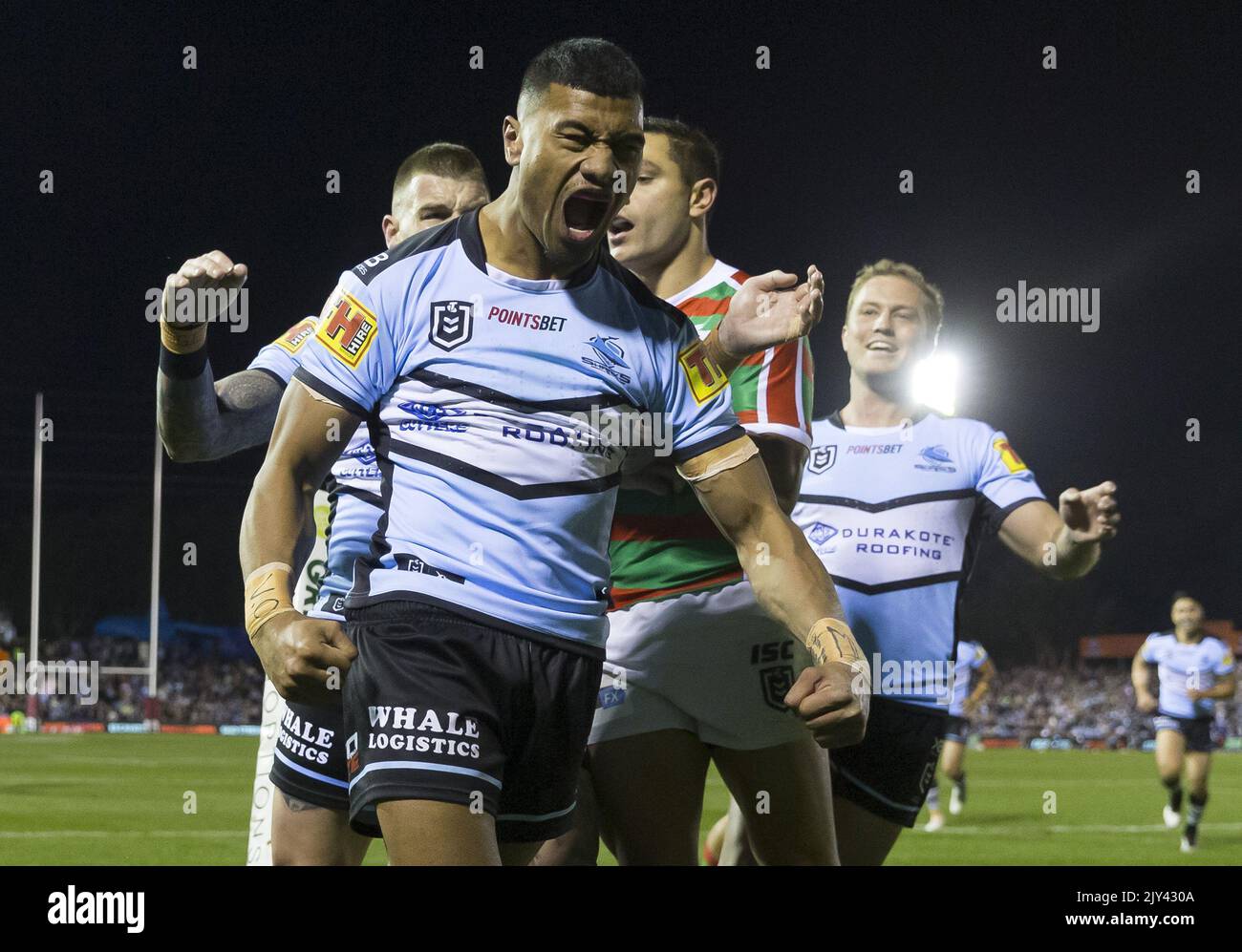 Ronaldo Mulitalo of the Sharks scores during the Round 20 NRL match between the Cronulla Sharks