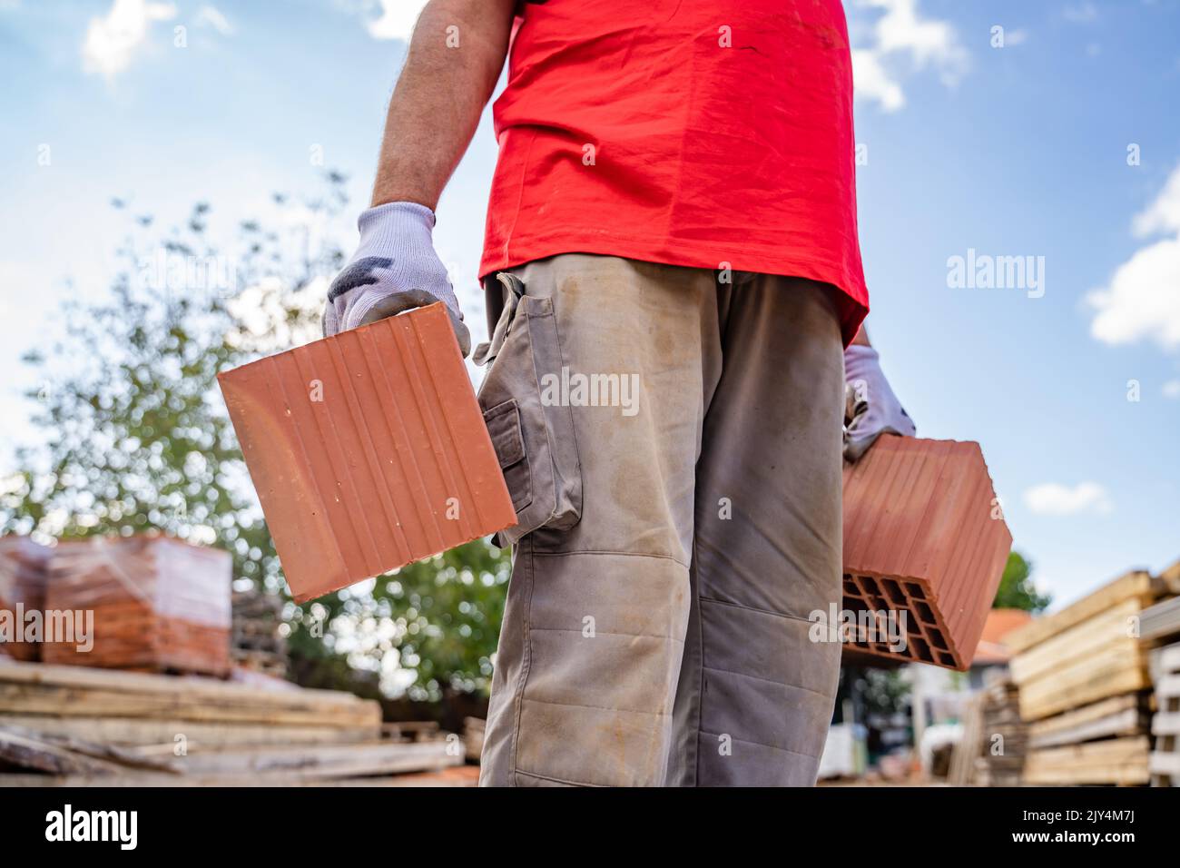 Construction Worker Carrying Bricks Hi Res Stock Photography And Images