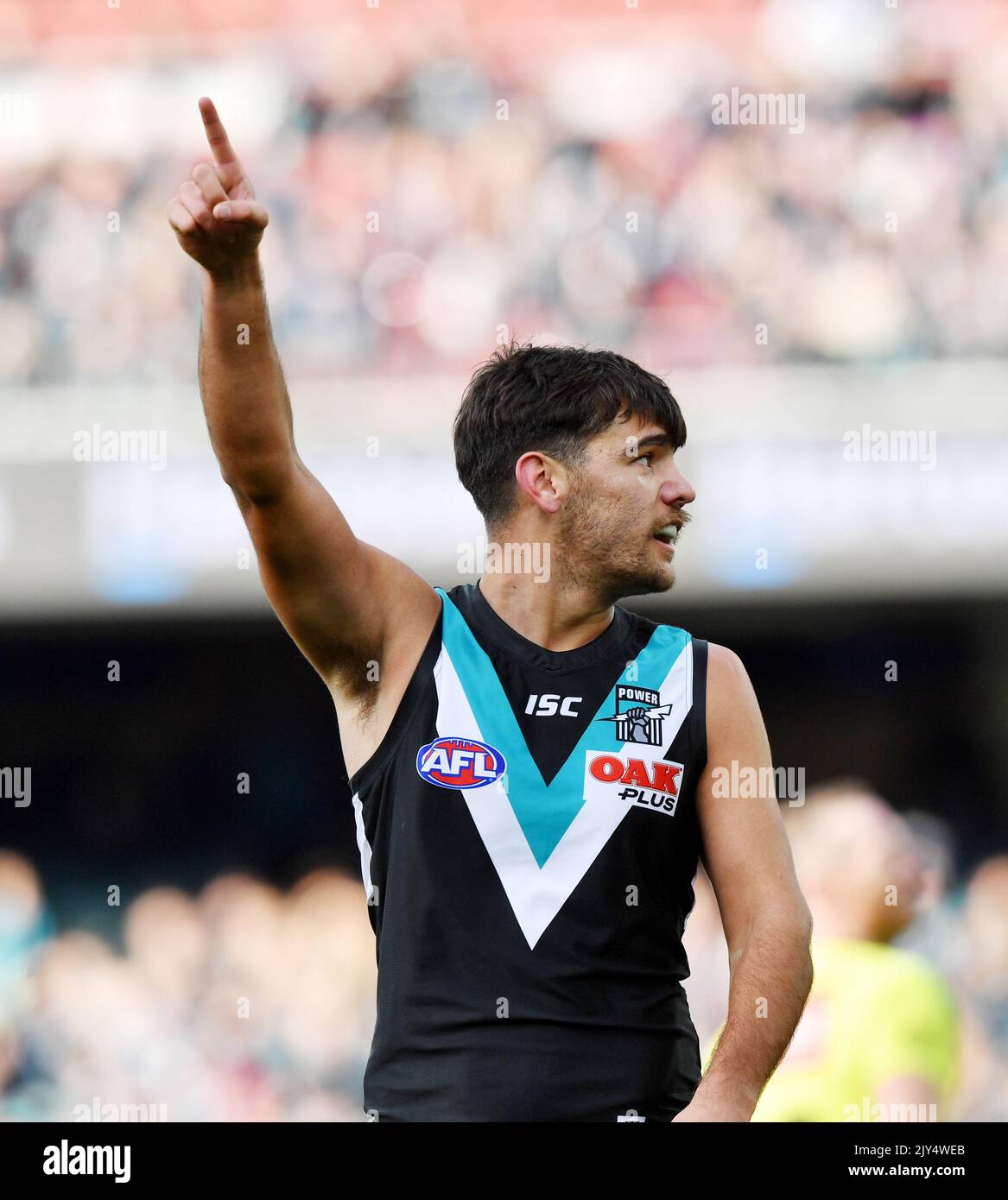 Riley Bonner of the Power reacts after scoring a goal during the Round 23 AFL match between the