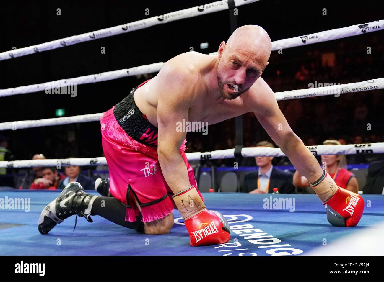 Damien Lock goes down against Bo Belbin during the 'Battle of Bendigo