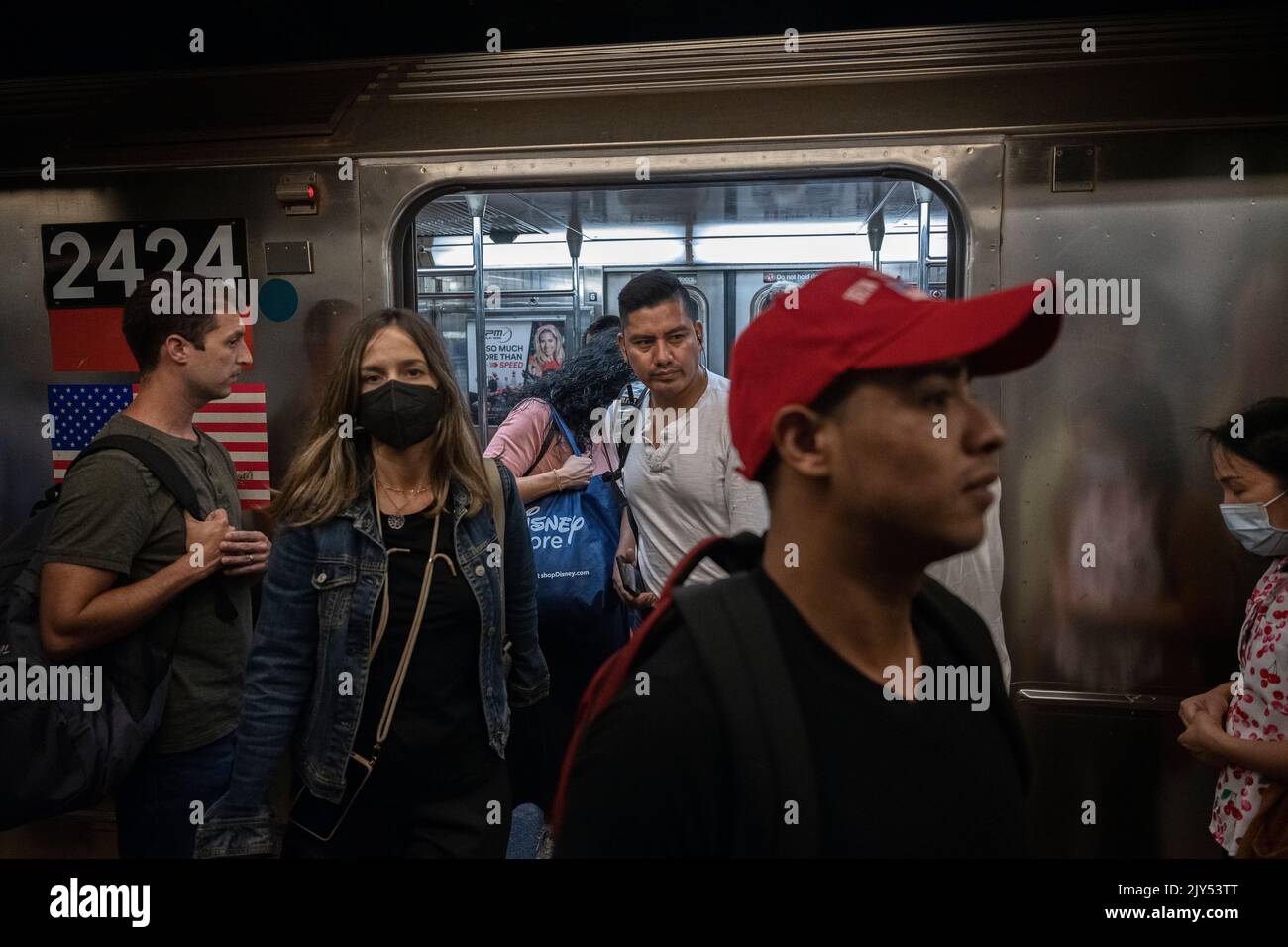 New York, New York, USA 7 September 2022 Riders with and without masks exit  1 train at Times Square hours after New York State Governor Kathy Hochul lifted pandemic mask requirement for New York transit riders Credit: Joseph Reid/Alamy Live News Stock Photo