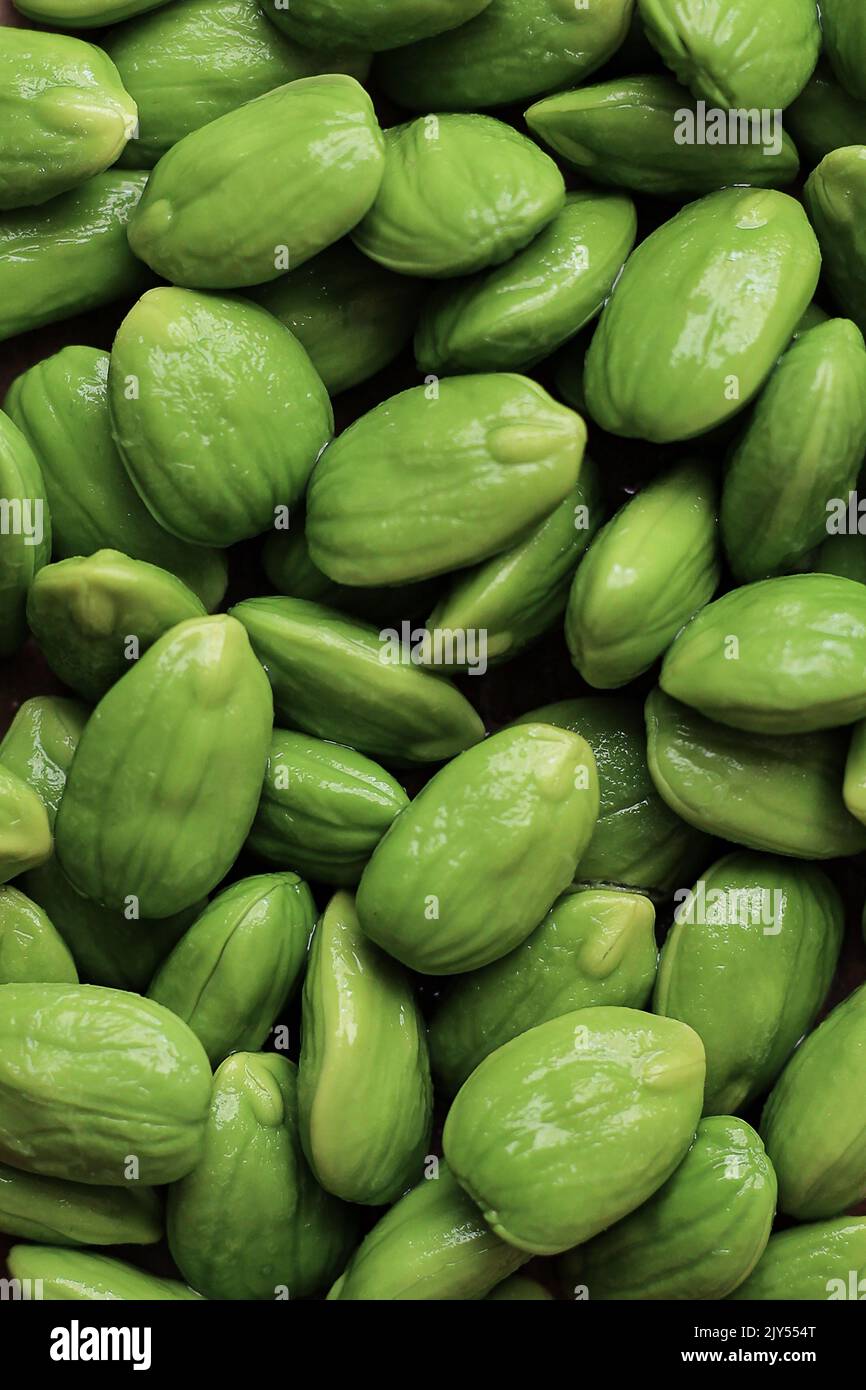 Food Background of Raw Peeled  Pete or Parkia speciosa. Petai Popular Stinky Bitter Bean from Indonesia Stock Photo