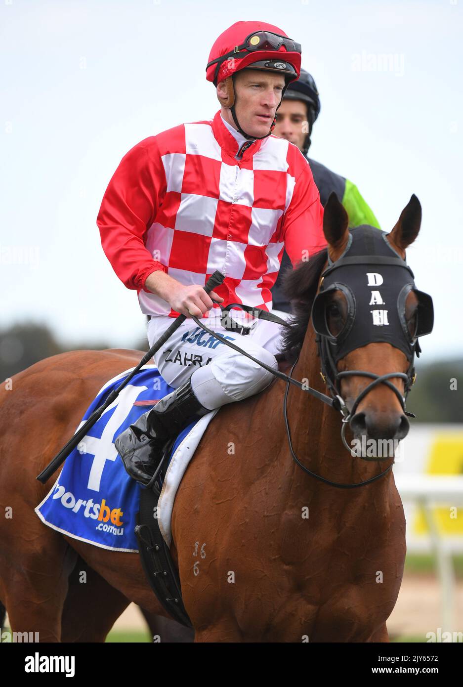 Jockey Mark Zahra returns to scale after riding Viking Warrior to ...