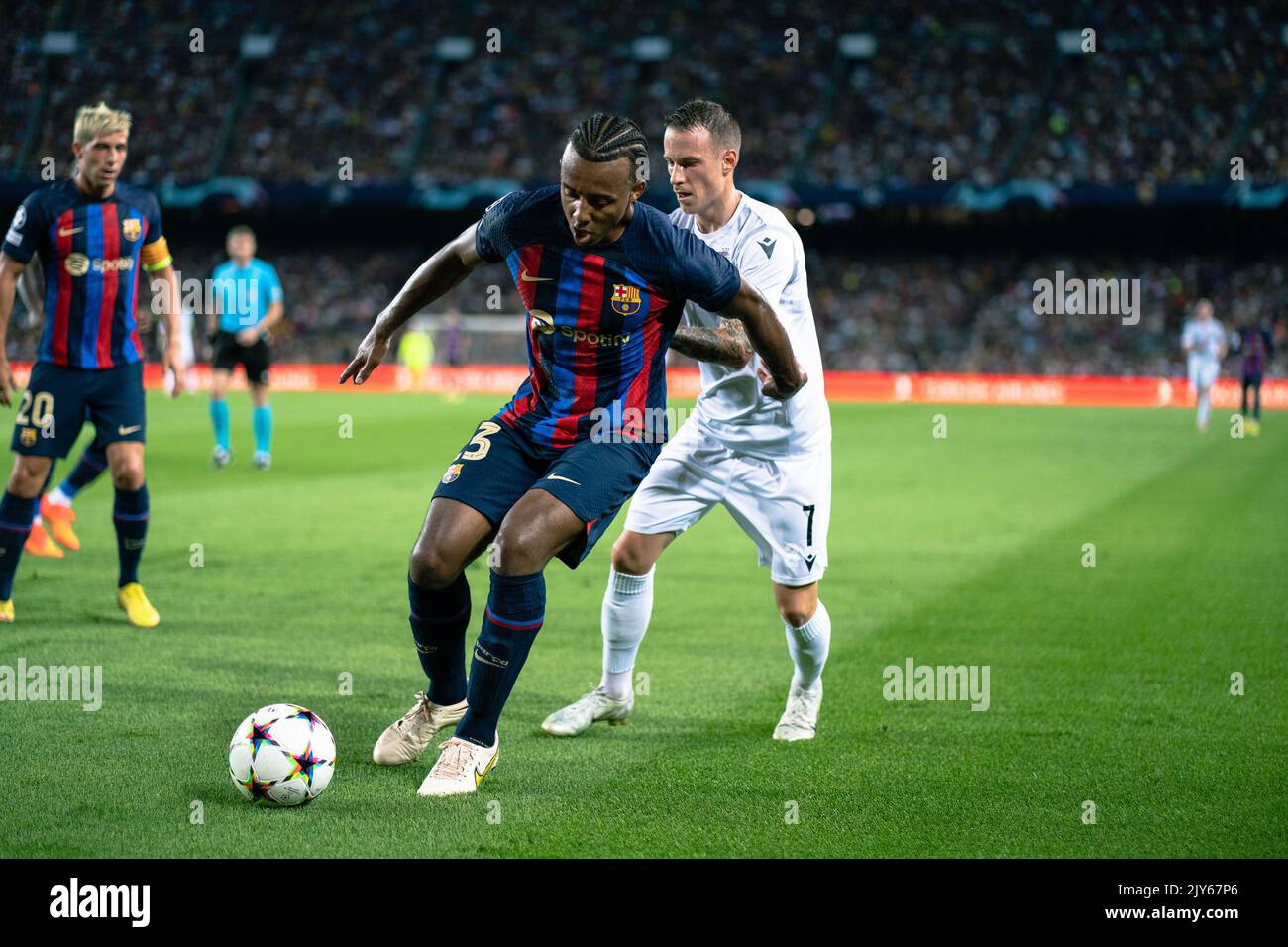 Barcelona, Spain. 7th Sep, 2022. Jules Kounde (L, front) of Barcelona vies with Jan Sykora of Viktoria Plzen during the UEFA Champions League Group C match between FC Barcelona and FC Viktoria Plzen in Barcelona, Spain, on Sept. 7, 2022. Credit: Joan Gosa/Xinhua/Alamy Live News Stock Photo