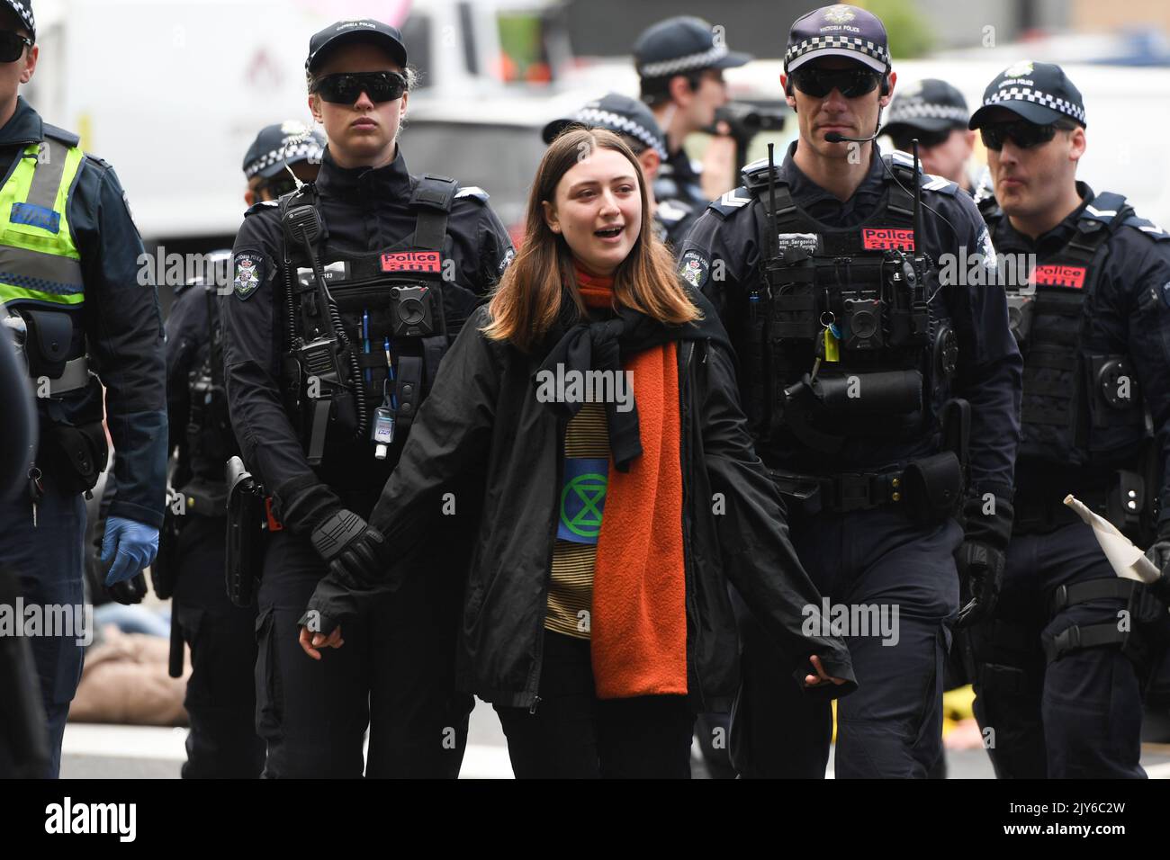An activists from Extinction Rebellion is arrested during a protest in ...