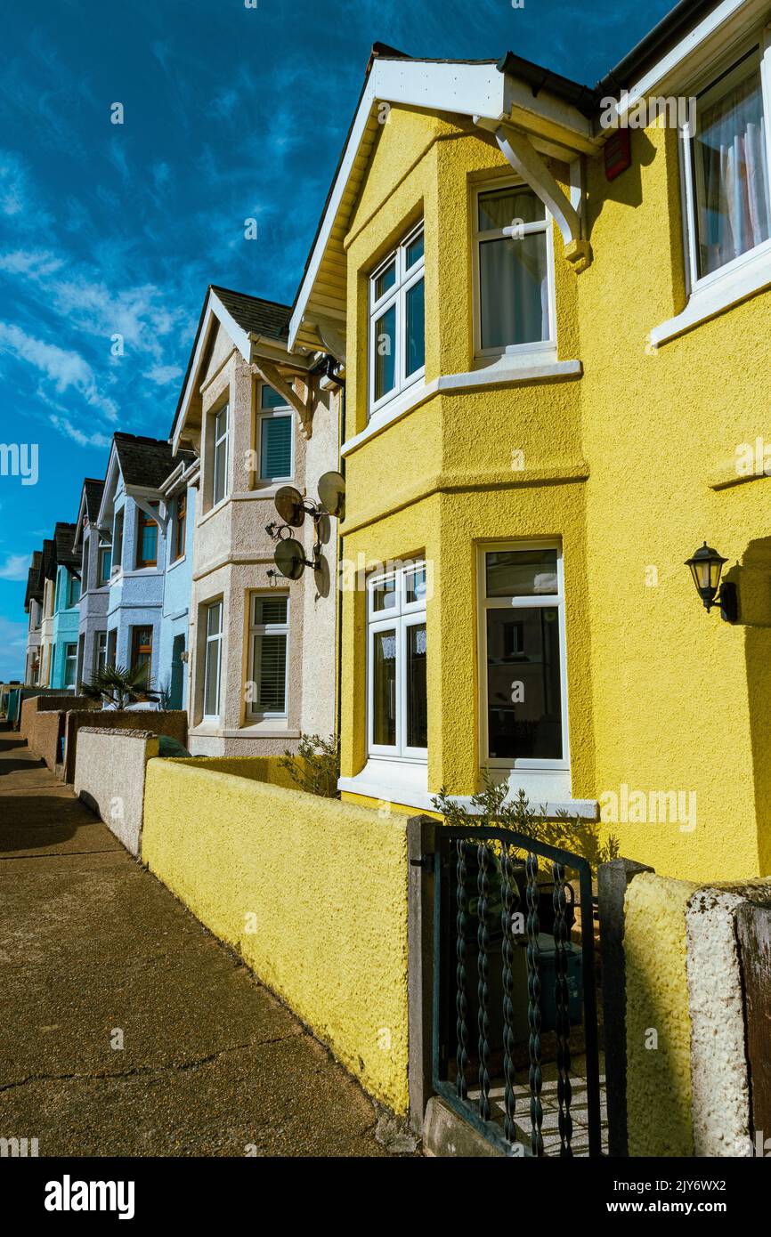 Row of very colourful buildings in town of Seaton, East Devon Stock Photo
