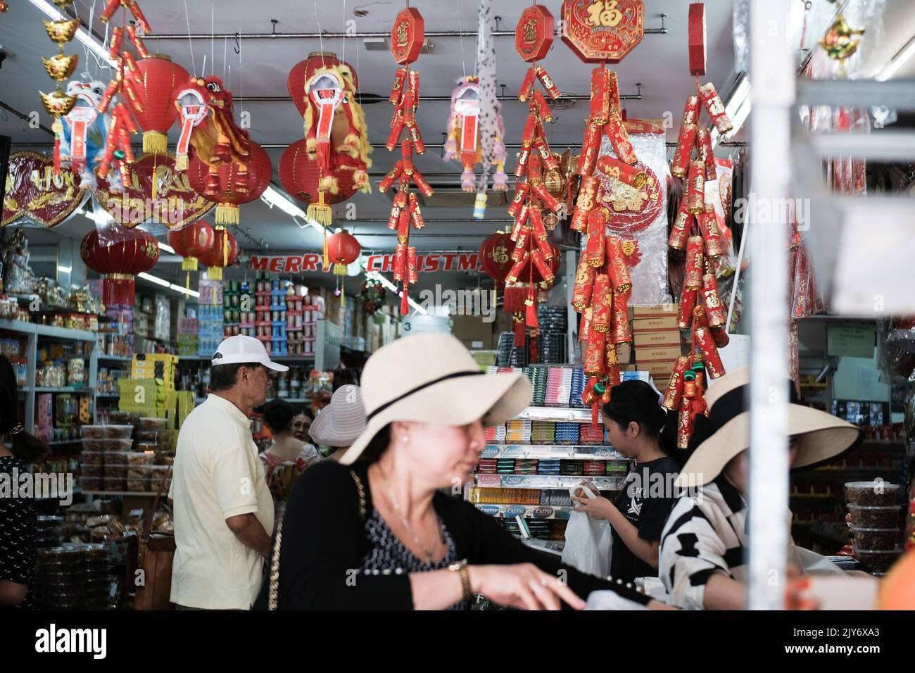 Lunar New Year decorations (firecrackers and red lanterns) for sale at an Asian grocer in Cabramatta — Sydney, Australia Stock Photo