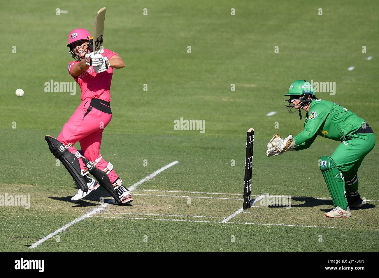 Ashleigh Gardner of the Sixers plays a shot during the WBBL match ...