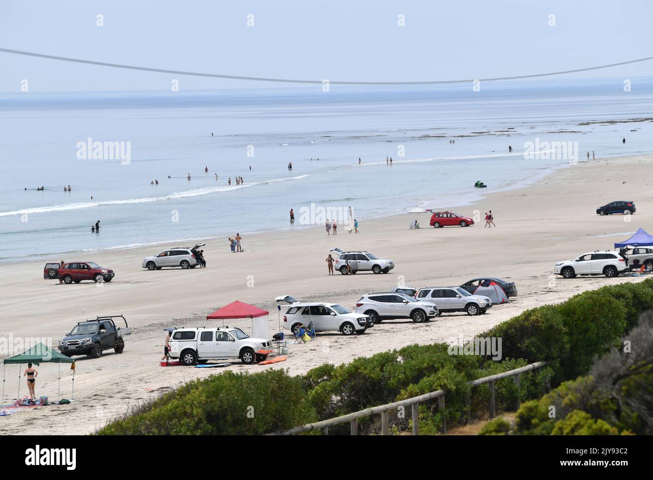 Cars are seen parked at Aldinga Beach in Adelaide, Tuesday, December 17, 2019. A heatwave