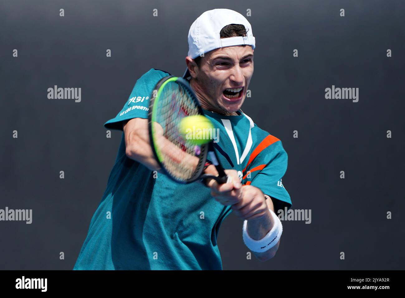 Ugo Humbert of France plays a return during his first round match