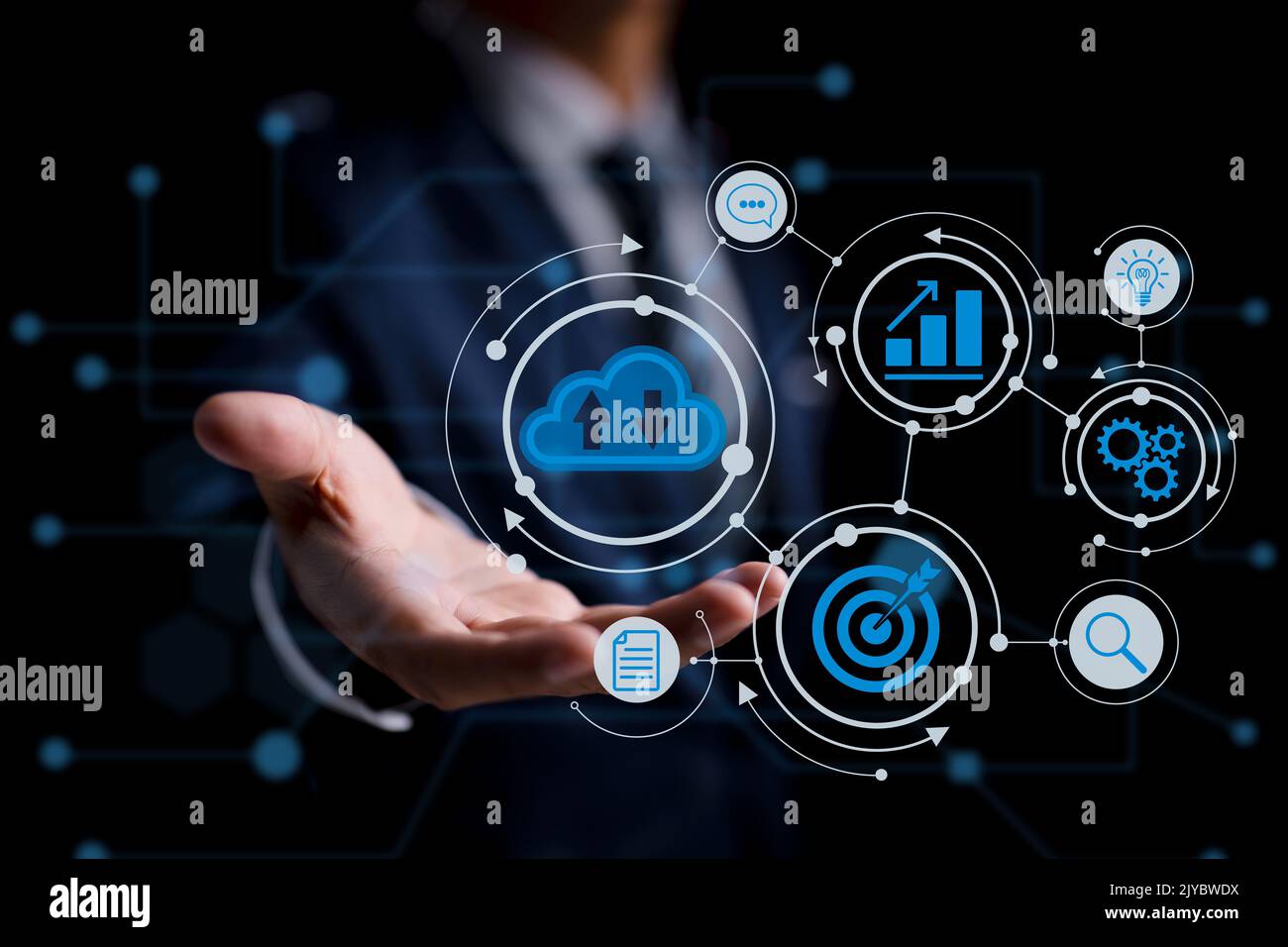 A person utilizing Cloud Computing Technology. Concept of an Internet Storage Network and a massive database of big data using internet technologies. Stock Photo