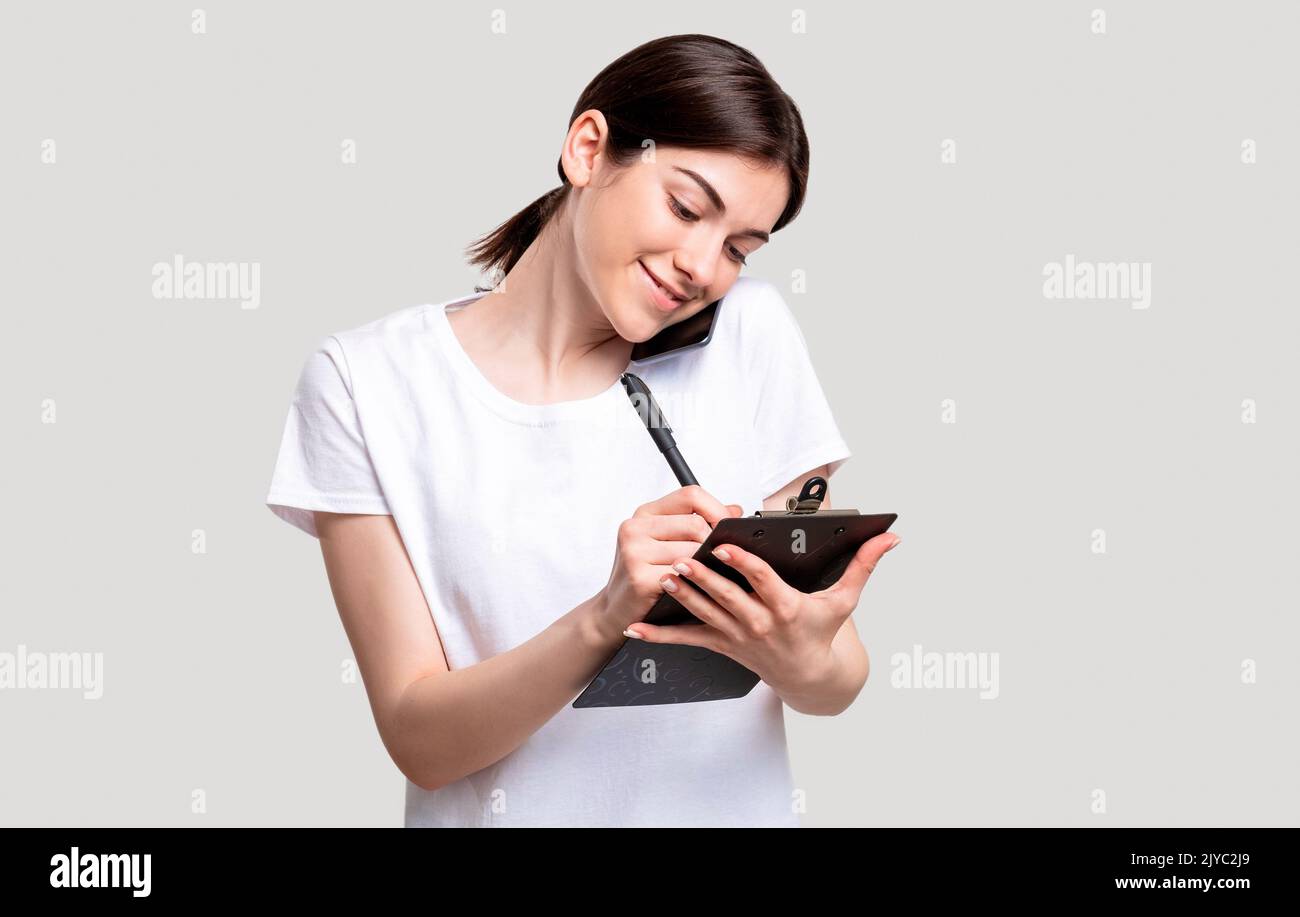 business call cheerful woman working project phone Stock Photo