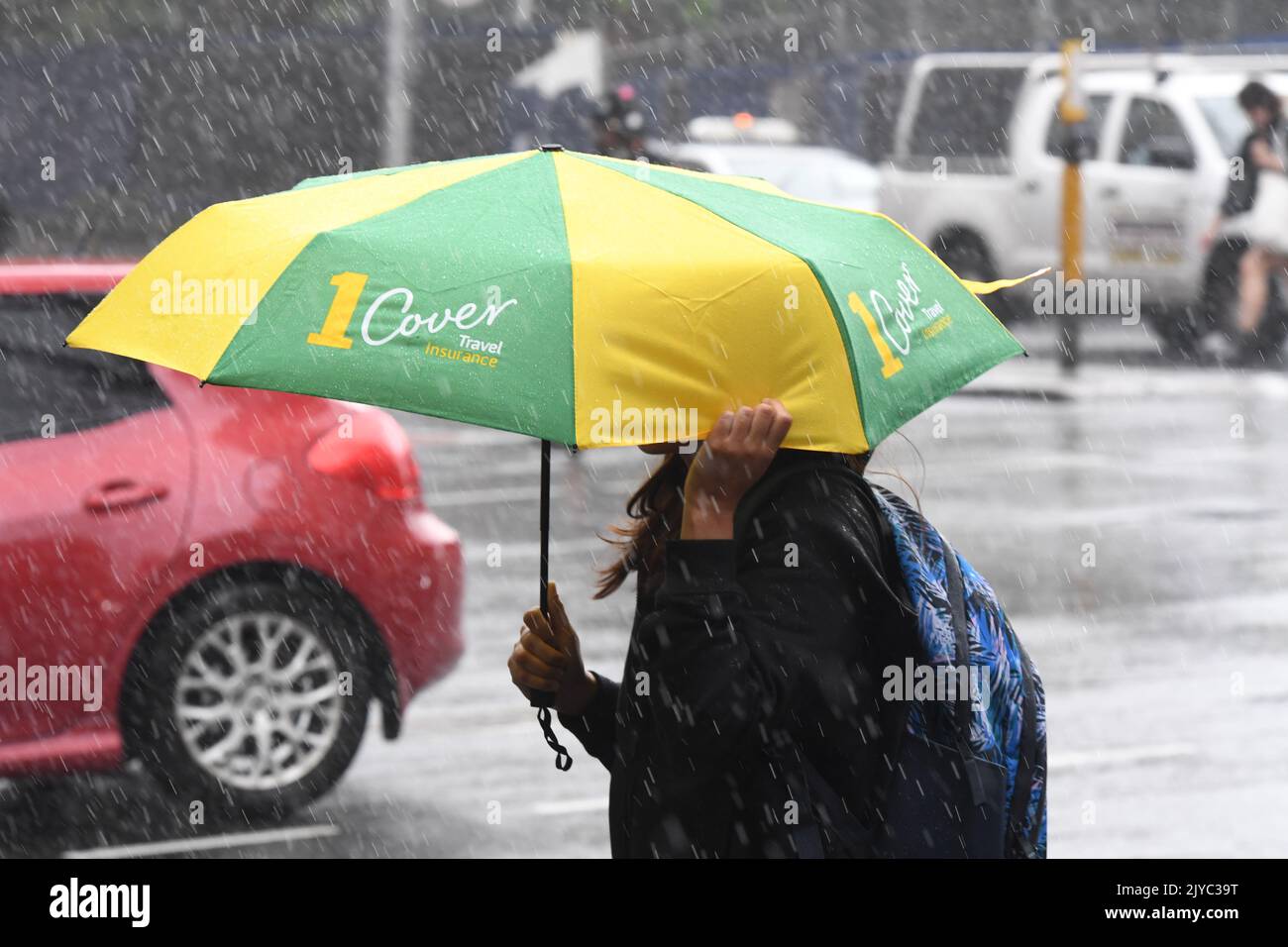 Peter Rae Zoom Raching Heavy rains effects Sydney CBD, Monday, March 9, 2020. (AAP Image/Peter ...