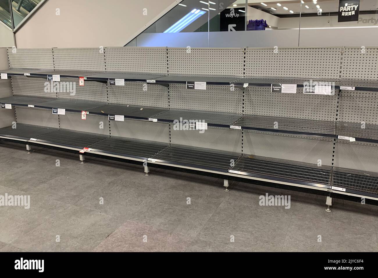 Empty shelves of tissues are seen at Woolworths Town Hall in Sydney, Friday, March 13, 2020. AAP
