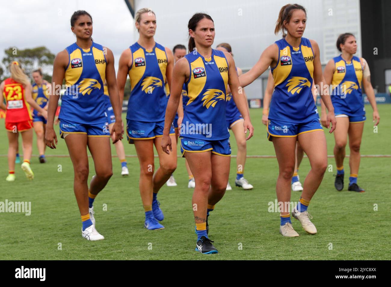 Eagles players leave the field after being defeated during the Round 6