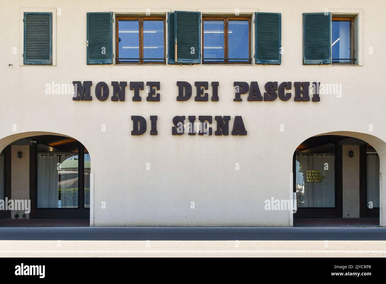 Façade of the Monte dei Paschi di Siena, historical Italian bank, in the coastal town of Castiglione della Pescaia, Grosseto, Tuscany, Italy Stock Photo