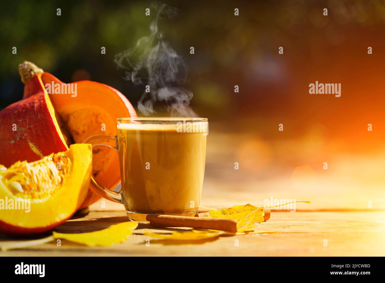 Coffee In September Pumpkin latte coffee with spices and cinnamon. Autumn hot drink on a ...
