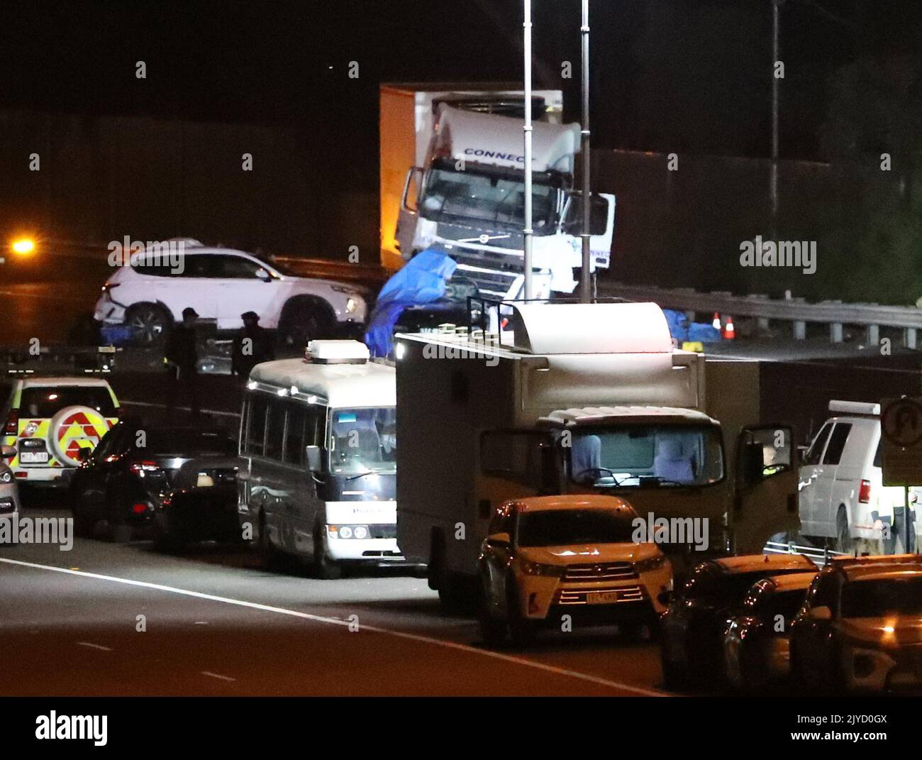 Emergency services respond to a collision on the Chandler Highway in the suburb of Kew in Melbourne, Wednesday, April 22, 2020. Four police officers have died after being hit by a truck