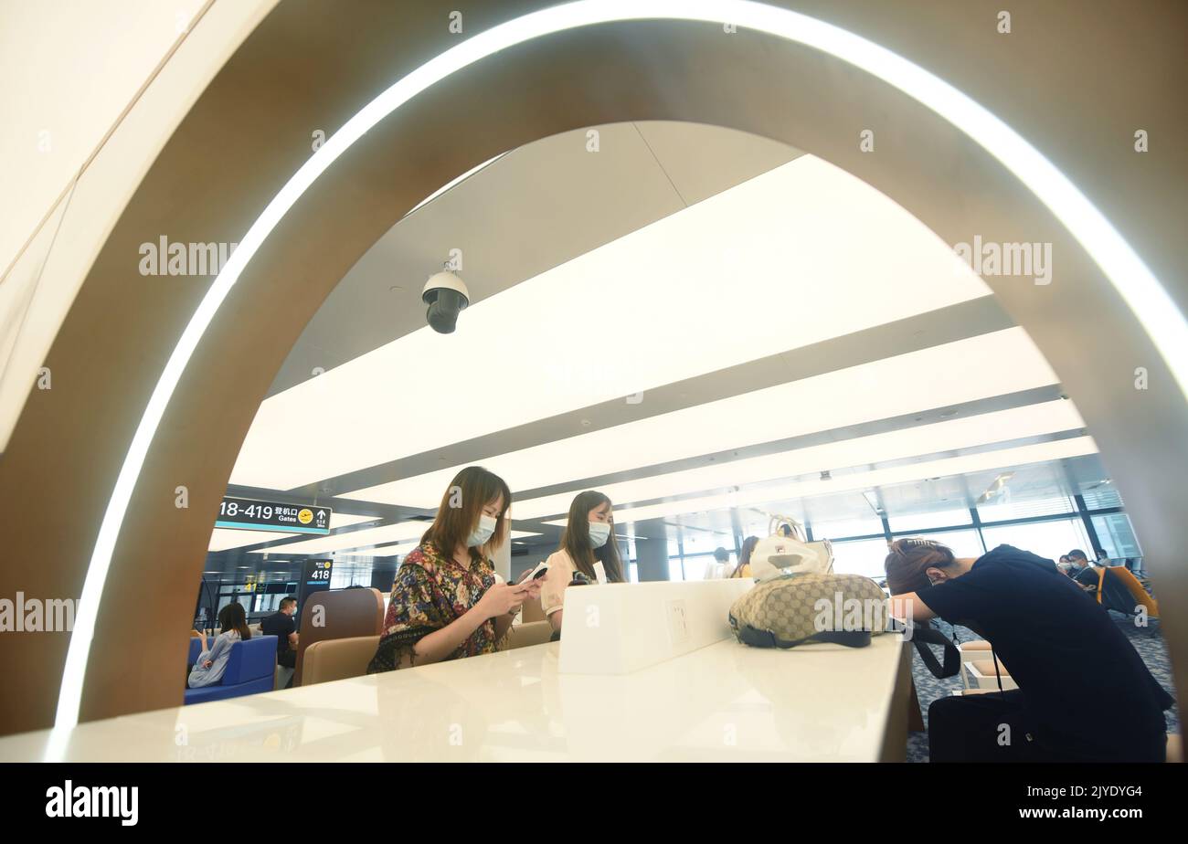 HANGZHOU, CHINA - SEPTEMBER 8, 2022 - Passengers rest in the airport ...