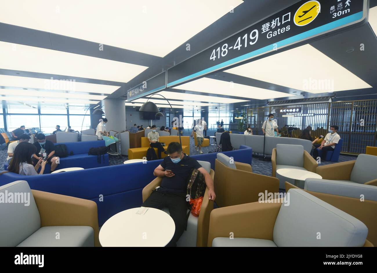 HANGZHOU, CHINA - SEPTEMBER 8, 2022 - Passengers rest in the airport ...