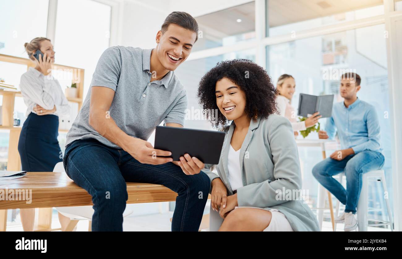 Business, team and meeting in social media at the office of happy employee workers on digital tablet working together. Teamwork, collaboration and Stock Photo