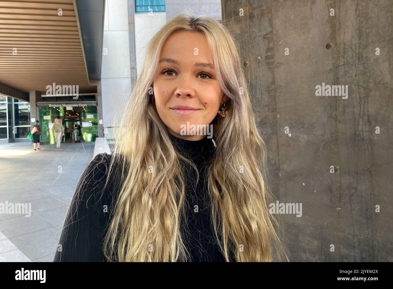 Lauren McGeachin speaks to the media outside the Brisbane Magistrates