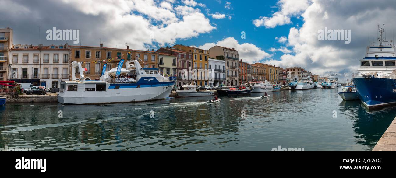 Boats and trawlers at the quay, on a summer day, in Sète in Occitanie, France Stock Photo
