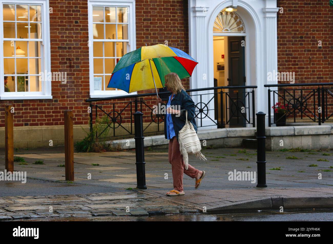 Tenterden, Kent, UK. 08 Sep, 2022. UK Weather: Heavy rain and thunder expected to hit this part of Kent later this afternoon as locals head to the high street with umbrellas. Photo Credit: Paul Lawrenson /Alamy Live News Stock Photo