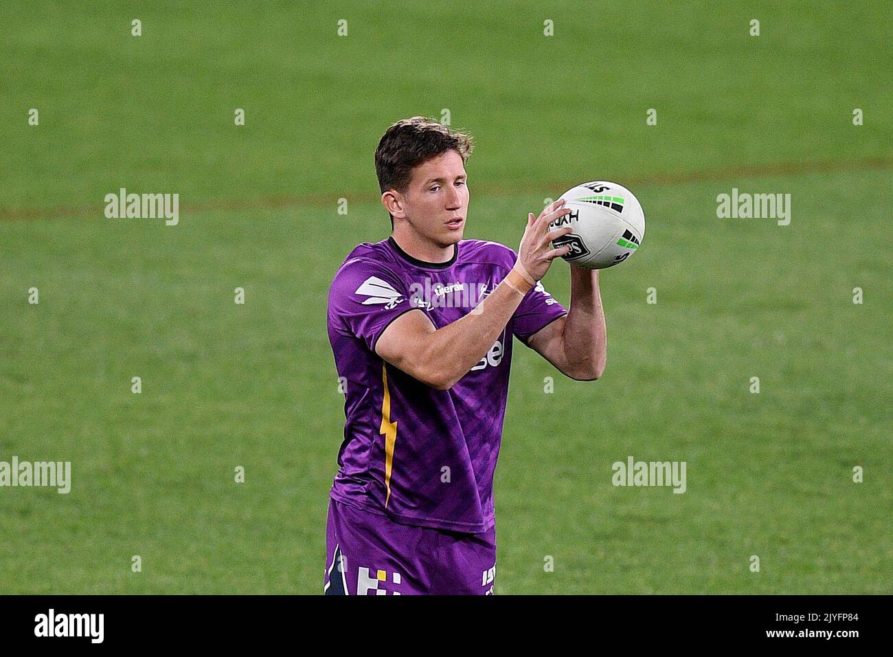 Cooper Johns of the Storm warms up ahead of the round 15 NRL match