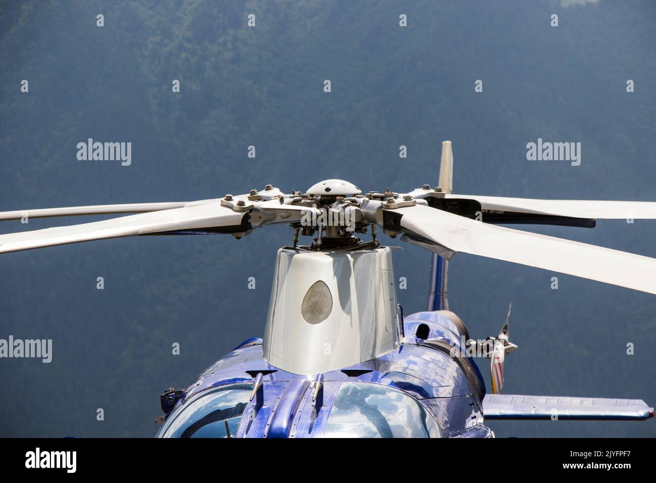 Helicopter close-up, blue and white helicopter view Stock Photo - Alamy
