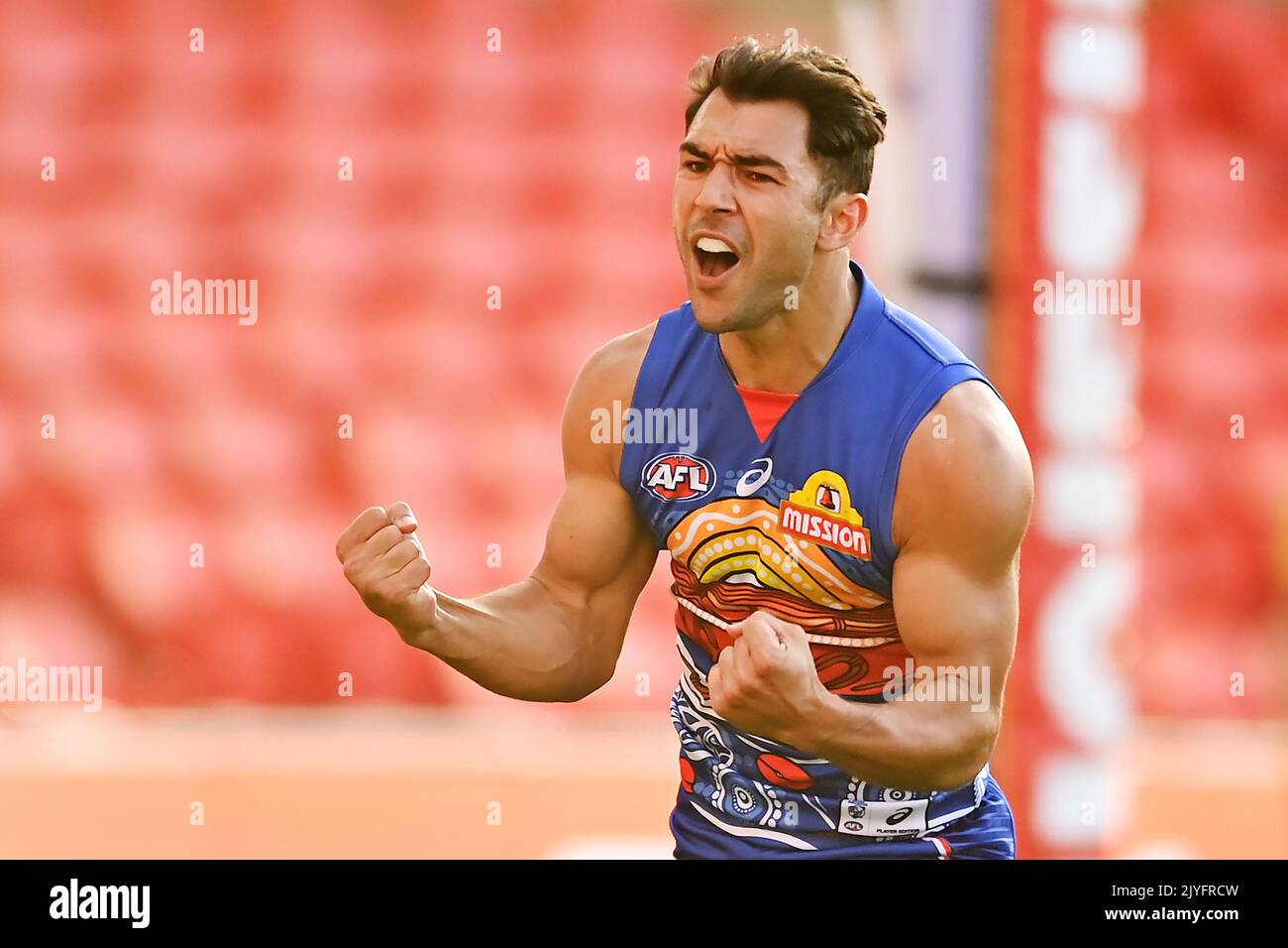 Ben Cavarra of the Bulldogs reacts after kicking a goal during the Round 12  AFL match between the Western Bulldogs and Adelaide Crows at Metricon  Stadium on the Gold Coast, Sunday, August