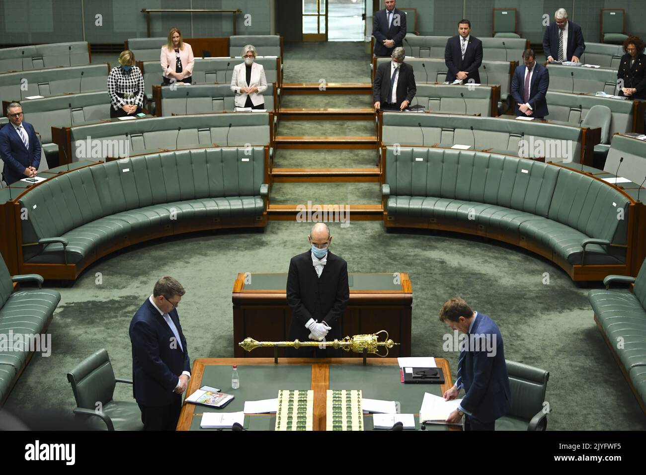 The SerjeantatArms places the mace in position at the beginning of