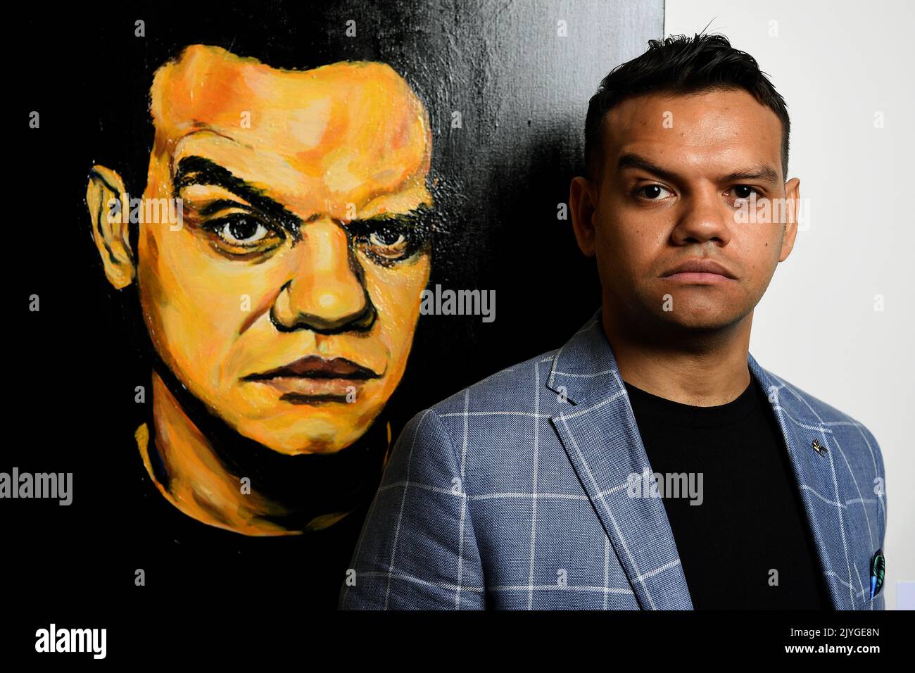 Meyne Wyatt poses for a photo with his Packing Room Prizewinning self