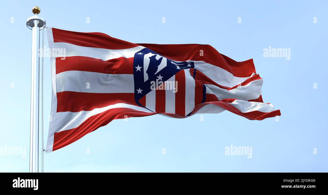 Madrid, Spain, May 2022: The flag of Atletico Madrid waving in the wind on a clear day. Atletico Madrid is a Spanish professional football club based Stock Photo