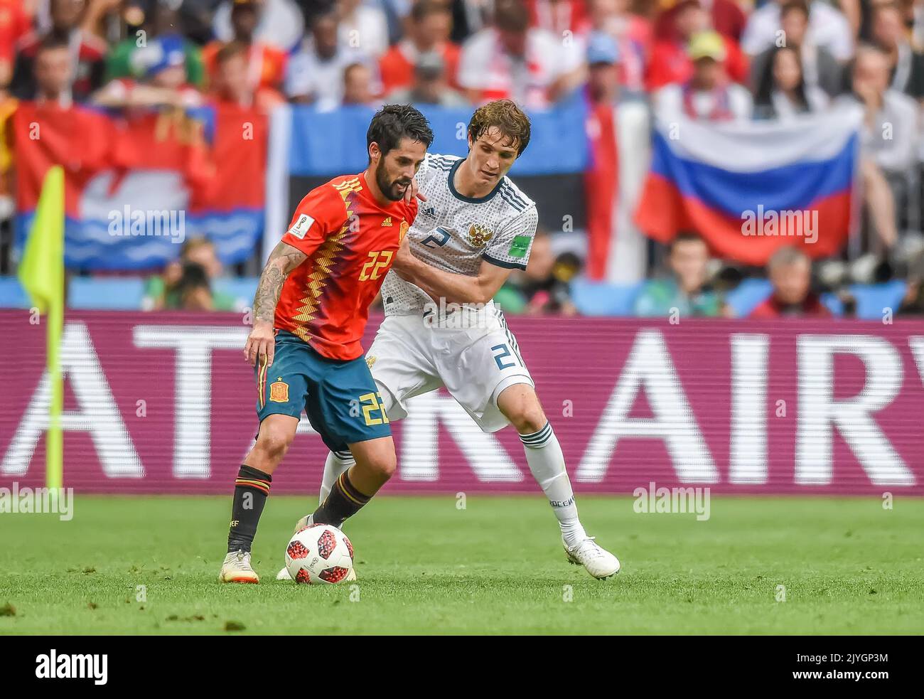 Moscow, Russia - July 1, 2018. Spain national football team midfielder Isco against Russia defender Mario Fernandes during FIFA World Cup 2018 Round o Stock Photo
