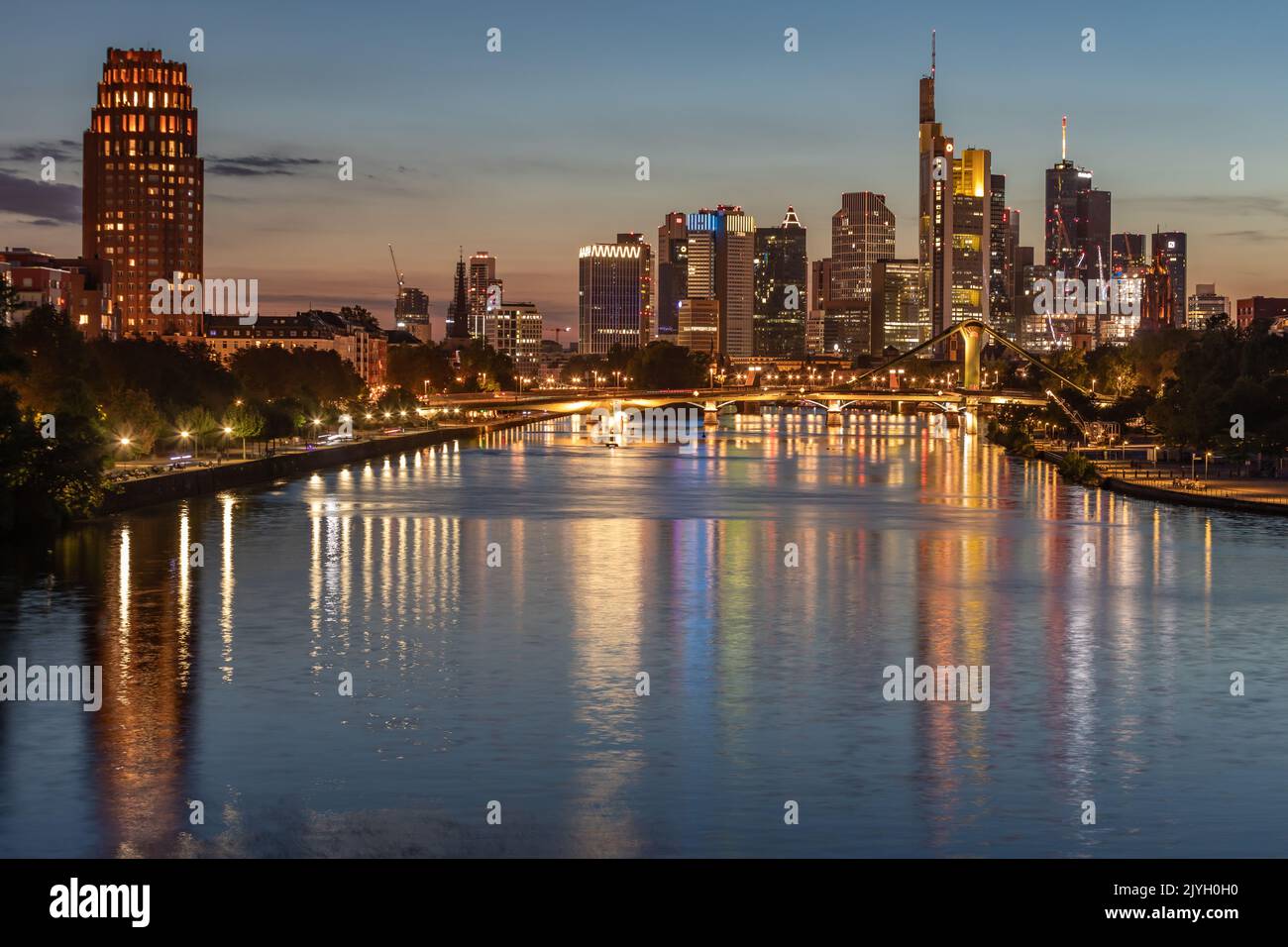 View over the Main to the Frankfurt skyline at night Stock Photo