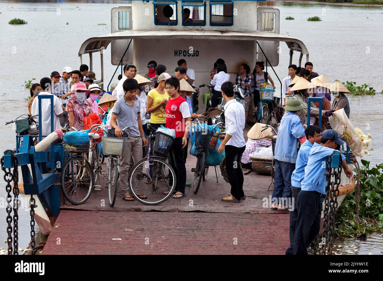 Passengers and ferry boat sailing from Hai Phong to Cat Ba, Vietnam