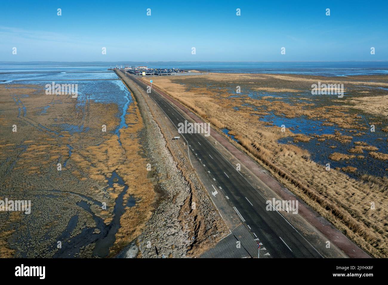 Ferry port and dam at the salt marshes, aerial view, Netherlands, Frisia, Holwerd Stock Photo