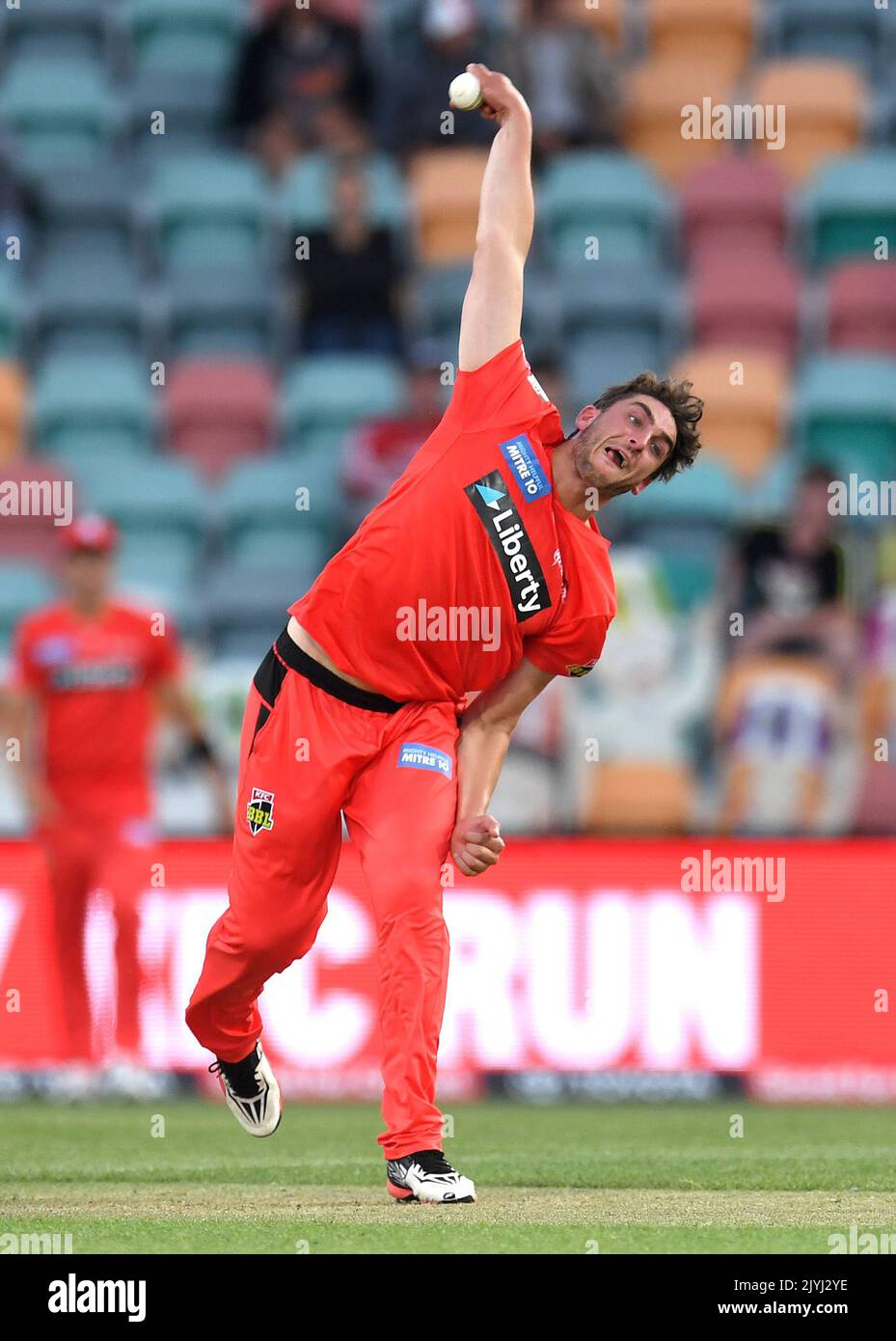 Peter Hatzoglou of the Renegades bowls during the Big Bash League