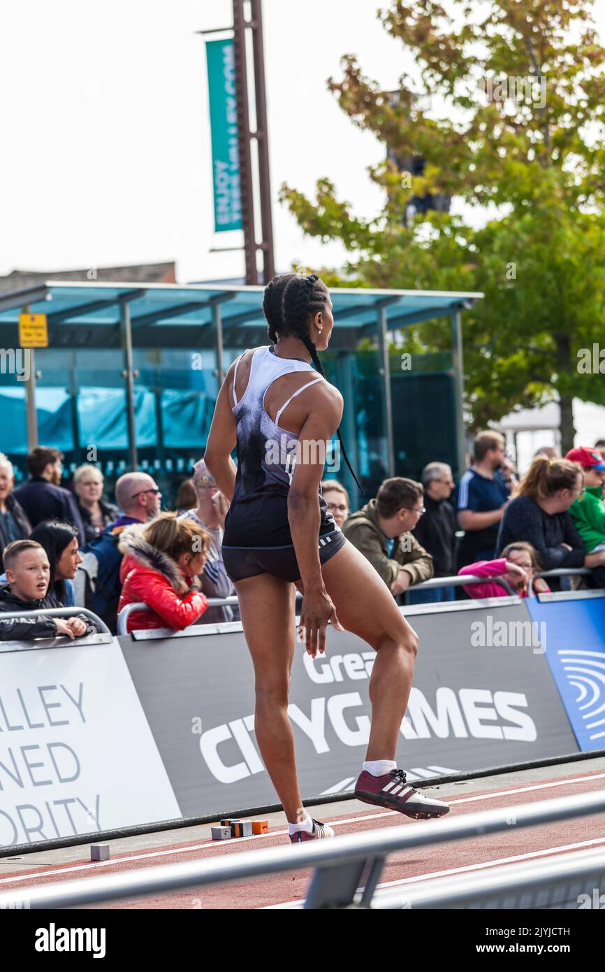 The Great North City Games were held in the High Street ,Stockton on Tees,England,UK.A female long jumper prepares for her jump Stock Photo