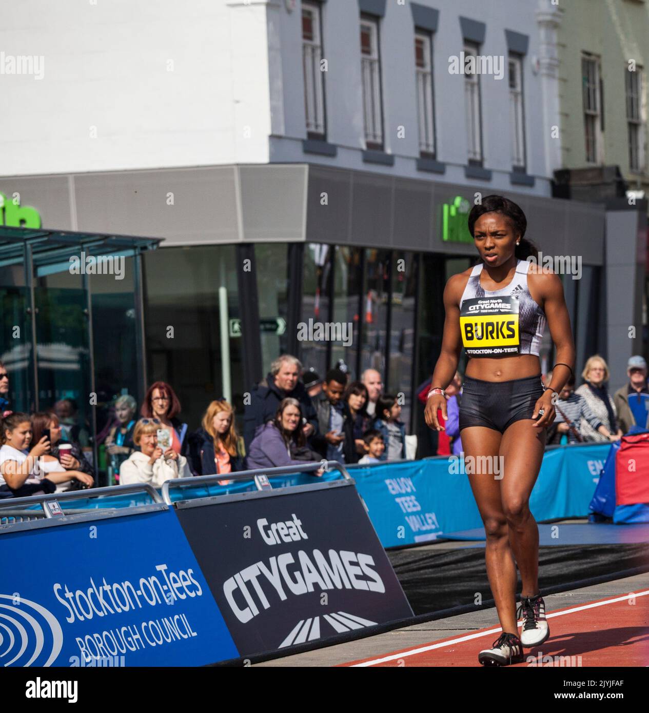 A female long jumper,Quanesha Burks, prepares for her jump in the Great North City Games were held in the High Street ,Stockton on Tees,England,UK Stock Photo