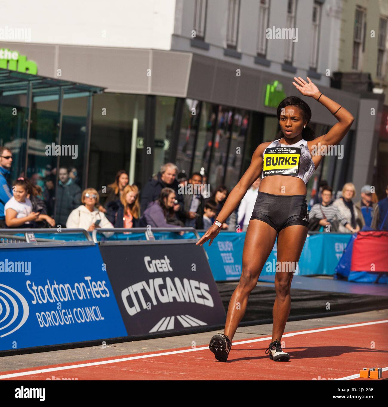 A female long jumper,Quanesha Burks, prepares for her jump in the Great North City Games were held in the High Street ,Stockton on Tees,England,UK Stock Photo