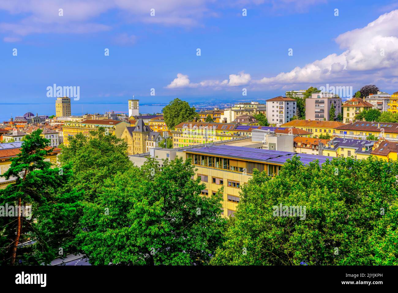 Panoramic view of Lausanne and Lake Geneva, capital city of Vaud Canton, Switzerland. It’s home to the International Olympic Committee headquarters, a Stock Photo
