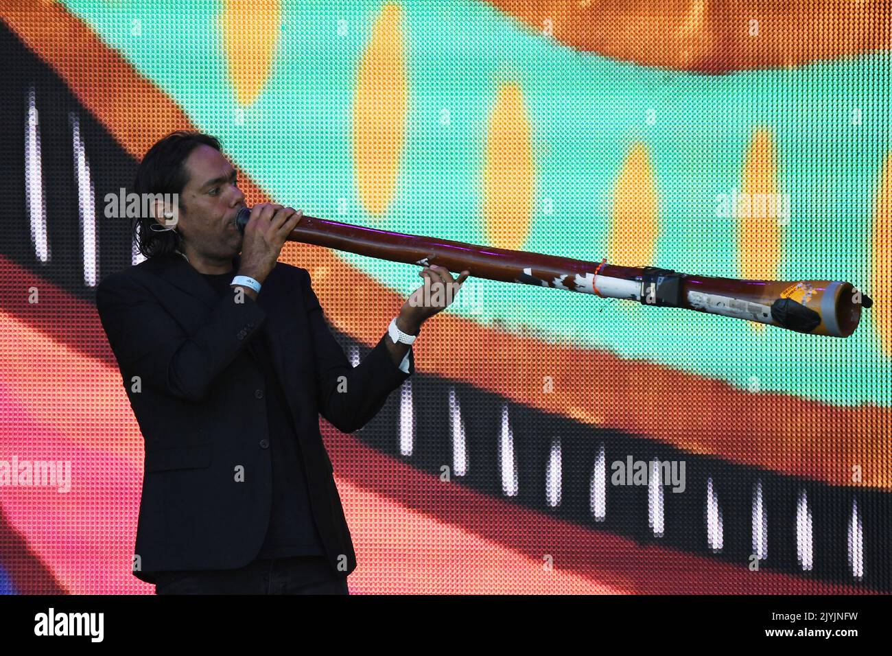 William Barton plays the didgeridoo during the WugulOra Morning Ceremony at Barangaroo Reserve