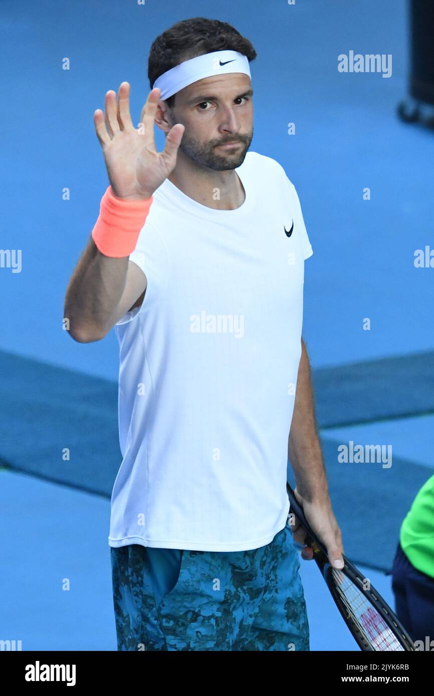 Grigor Dimitrov of Bulgaria waves after winning his fourth Round Mens singles match against Dominic Thiem of Austria on Day 7 of the Australian Open at Melbourne Park in Melbourne, Sunday, February