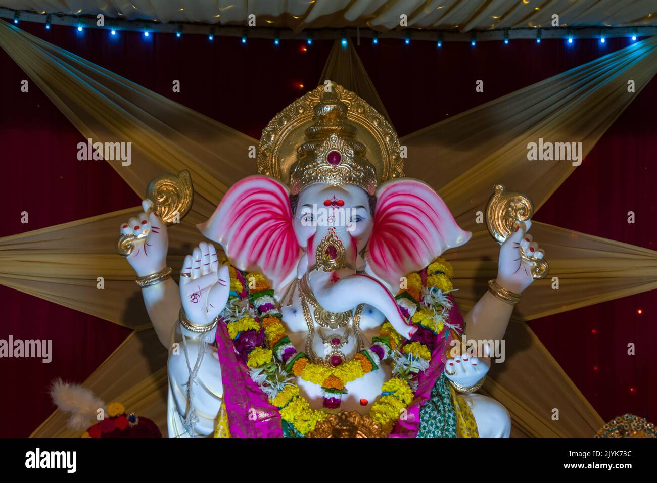 A beautiful idol of Lord Ganesha being worshipped at a mandal in Mumbai ...