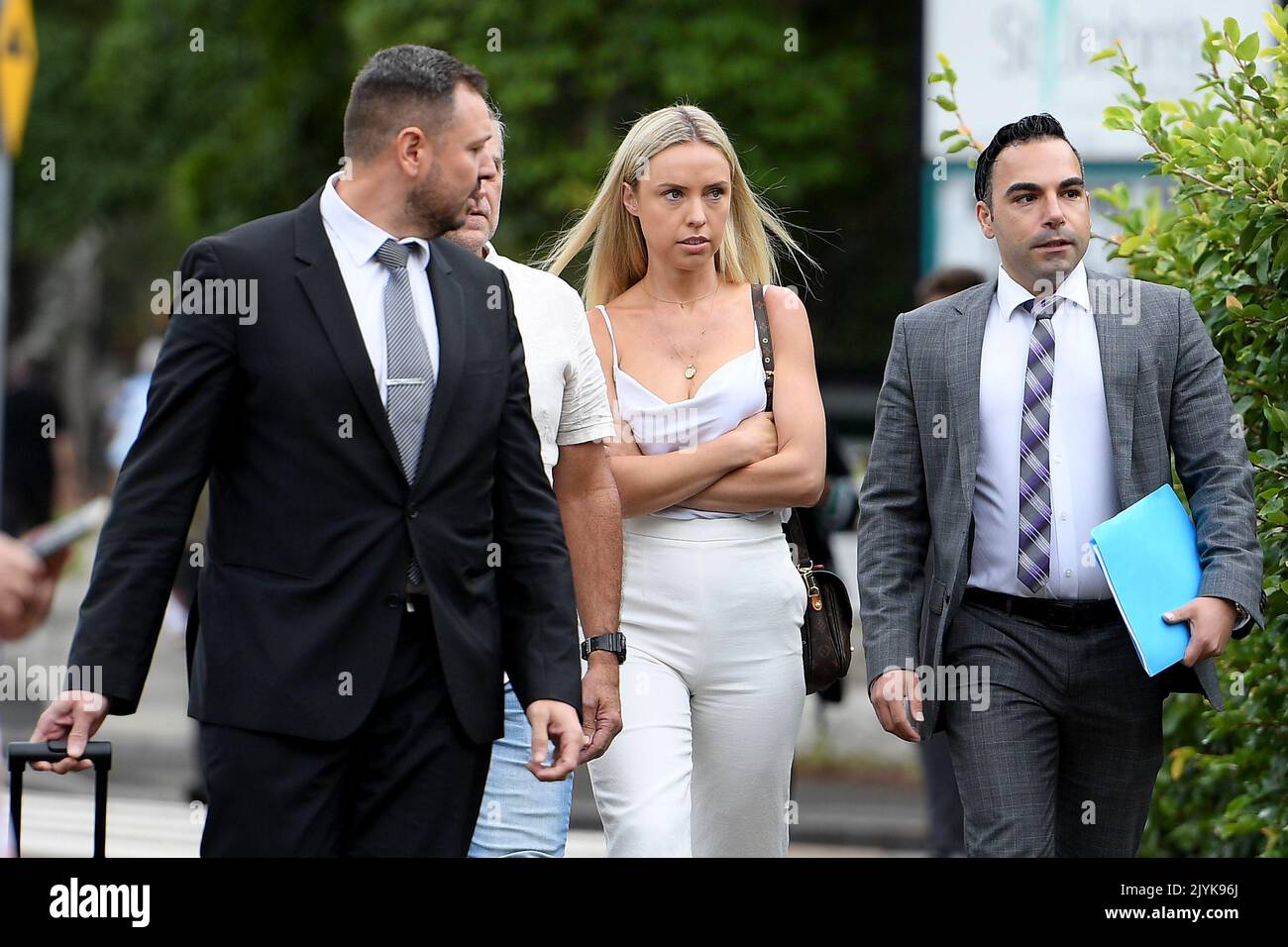 Kara Childerhouse (centre), the fiancee of former NRL player Michael Lichaa arrives at