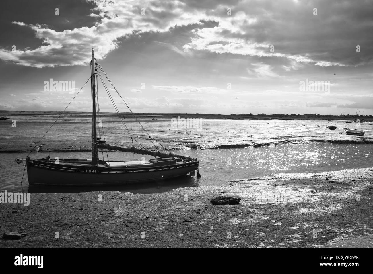 Trawler fishing in estuary uk Black and White Stock Photos & Images - Alamy