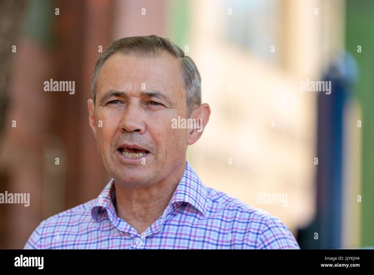 Western Australia Health Minister Roger Cook talks during a press
