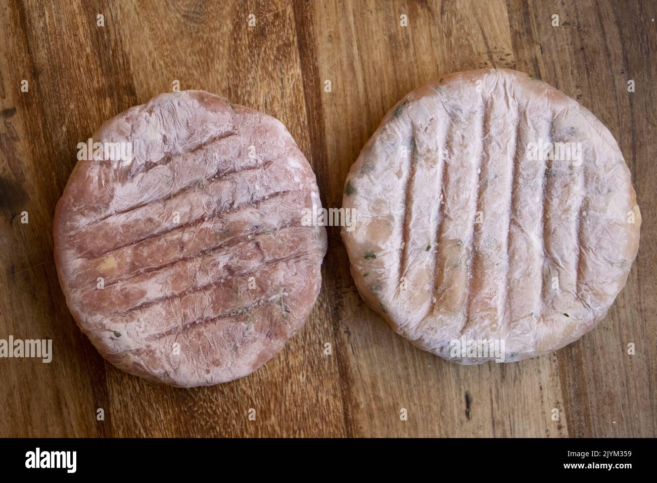 frozen assorted hamburgers of white and red meat Stock Photo